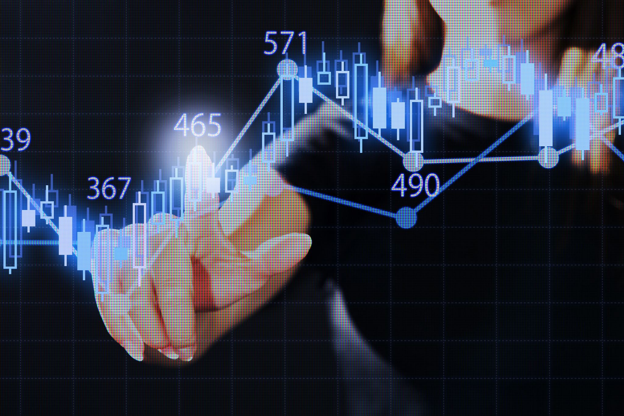 Person-pointing-at-the-stock-market-graph-with-virtual-screen